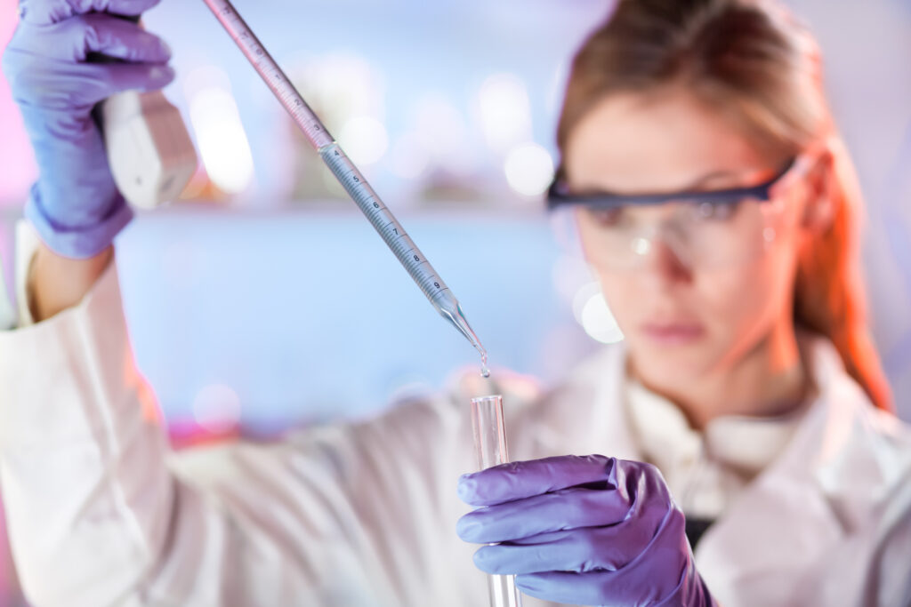 Image of a life scientist in laboratory gear.